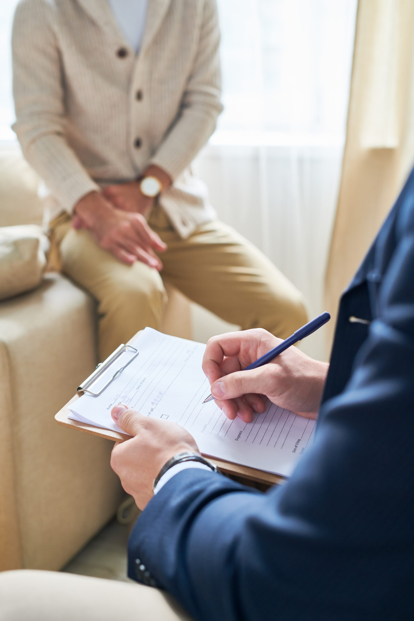 Psychiatrist taking notes scaled